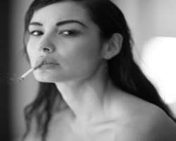 Berenice Marlohe smoking